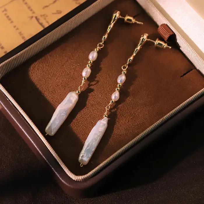 Boucles d'oreilles baroques naturelles avec pampilles en perles de cuivre