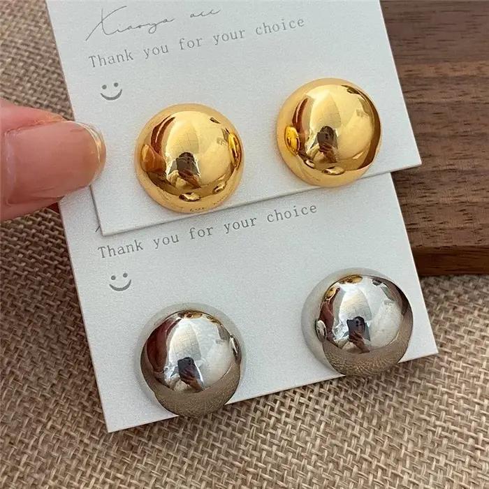 Boucles d'oreilles clous grandes et rondes en métal tendance pour femmes