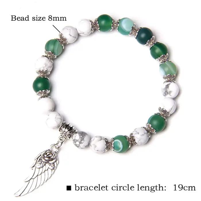 Bracelet pendentif aile d'ange Rose couleur argent fait à la main