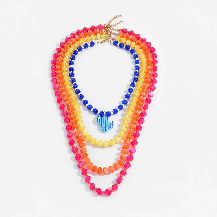 Collier bohème tendance 2026 perles roses oranges rouges breloques goutte d'eau bijoux femme occasions spéciales mariage fête