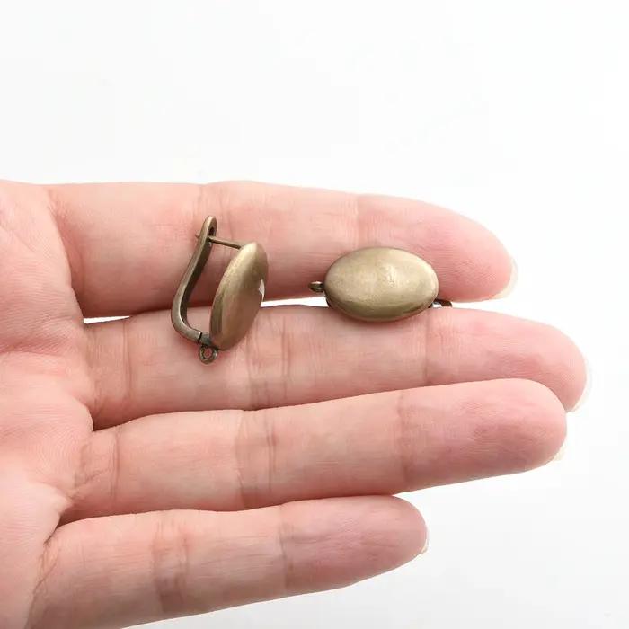 1 paire de boucles d'oreilles en Bronze Antique