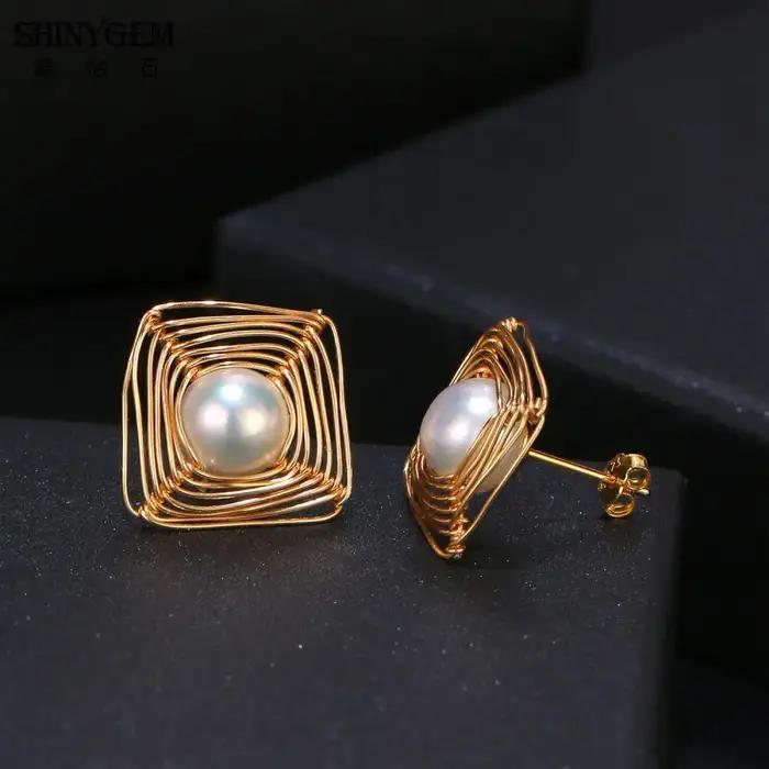 Boucles d'oreilles en perles baroques remplies d'or