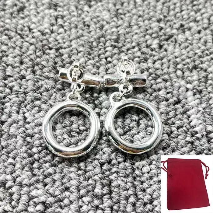 Boucles d'oreilles en or et argent pour femmes