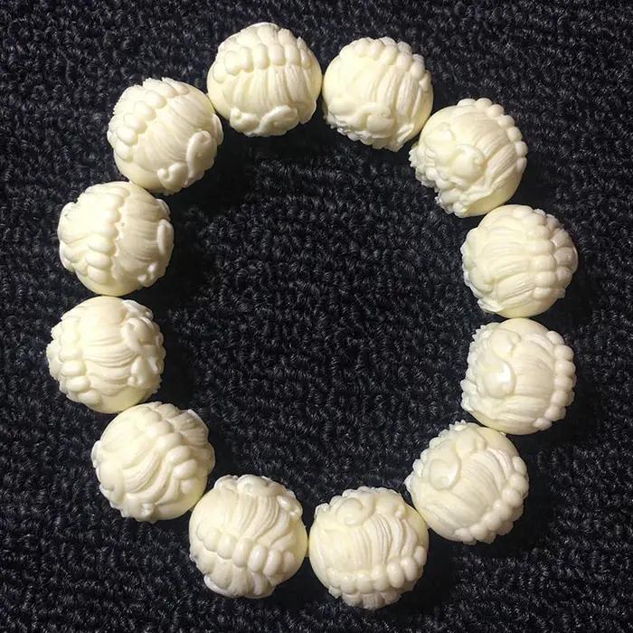 Bracelet de perles Pixiu sculptées en ivoire naturel