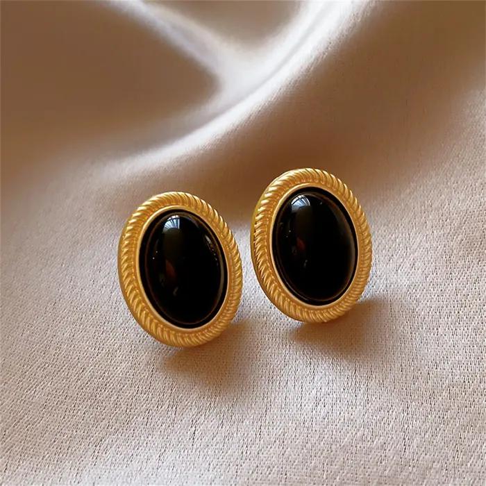 Nouvelles Boucles d'Oreilles Clous Ovales Noires en Métal Doré Style Rétro 2026 pour Femmes – Design Avancé