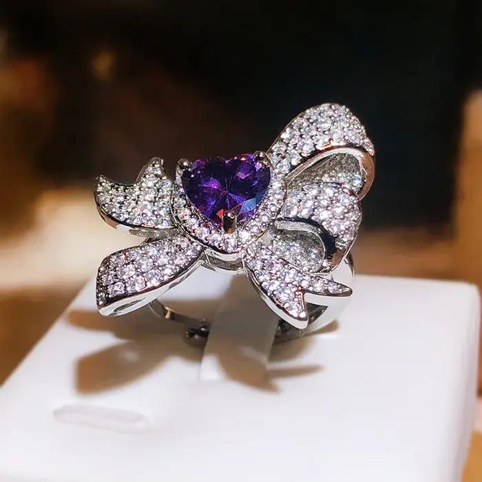 Bague papillon incrustée de saphir exagéré en argent 925