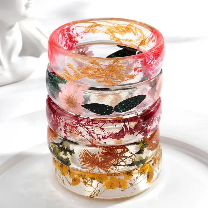 Nouveau bracelet large en résine époxy avec fleurs séchées pour femme
