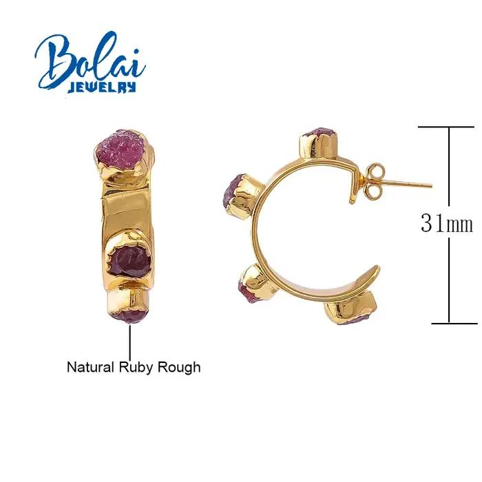 Boucle d'oreille en pierres précieuses faites à la main