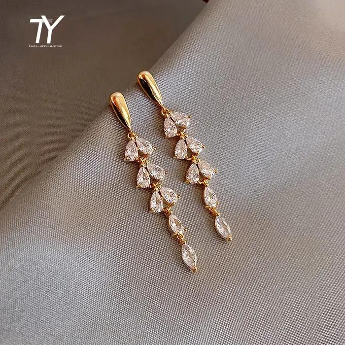 Boucles d'oreilles dorées brillantes en Zircon en forme de feuille pour femmes