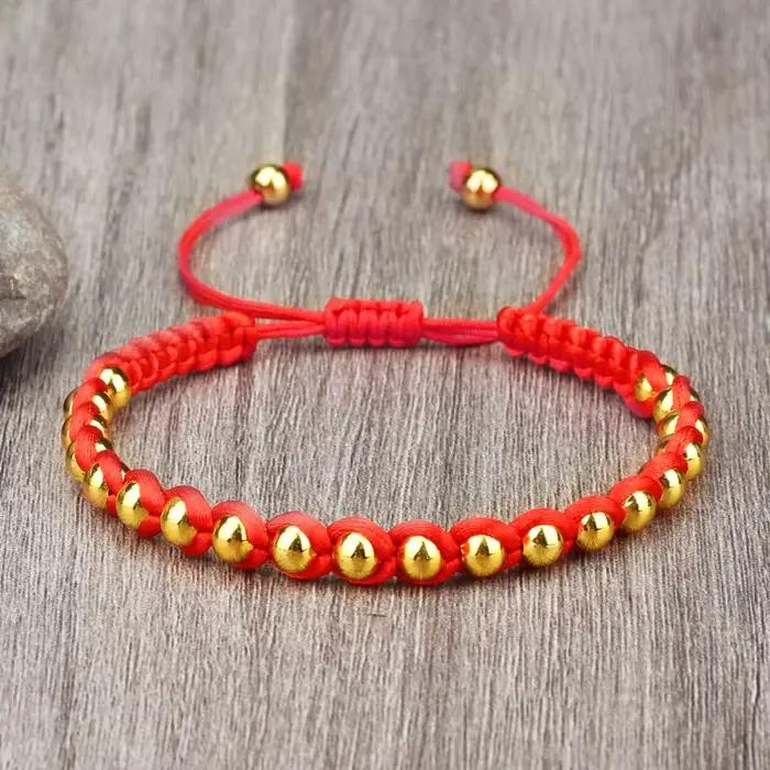 Bracelet Tressé Porte-Bonheur RaeRina en Corde Rouge et Perles en Cuivre Pour Homme et Femme Occasions Spéciales