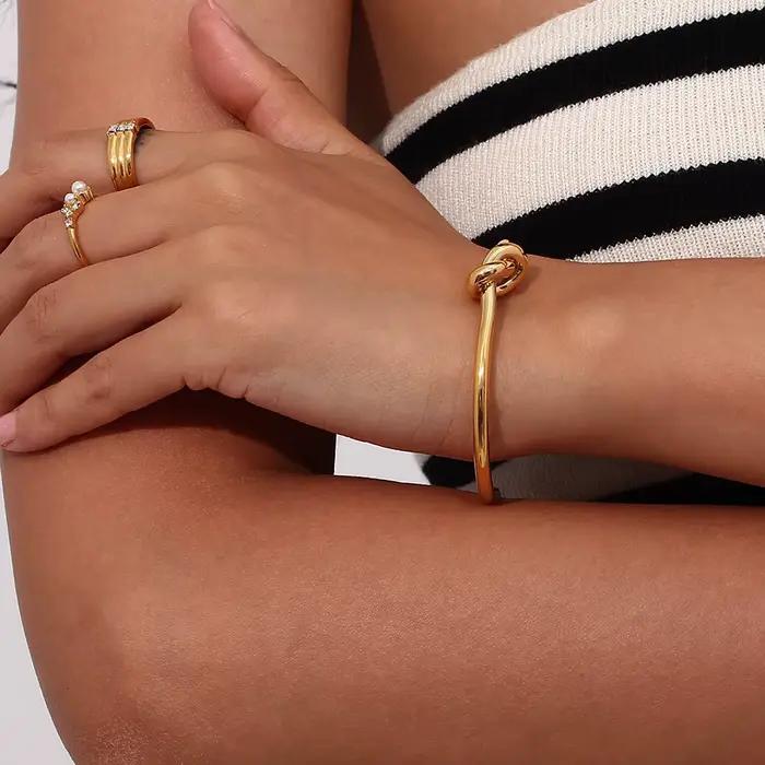 E.B.belle minimaliste 18K plaqué or noeud manchette bracelets pour femme en acier inoxydable bijoux imperméables pour femme