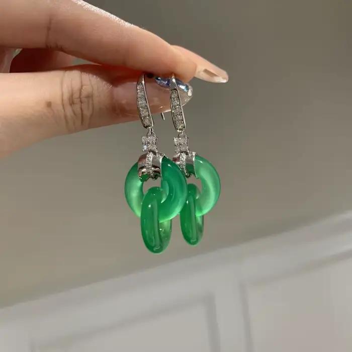 Boucles d'oreilles entrelacées fraîches en argent 925 incrusté de diamants