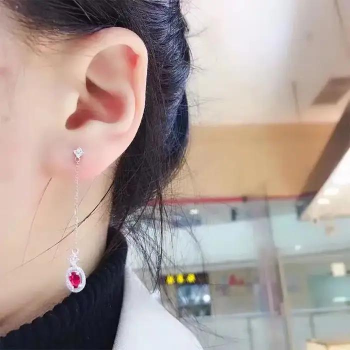 Boucles d'oreilles pendantes incrustées d'argent pour femmes