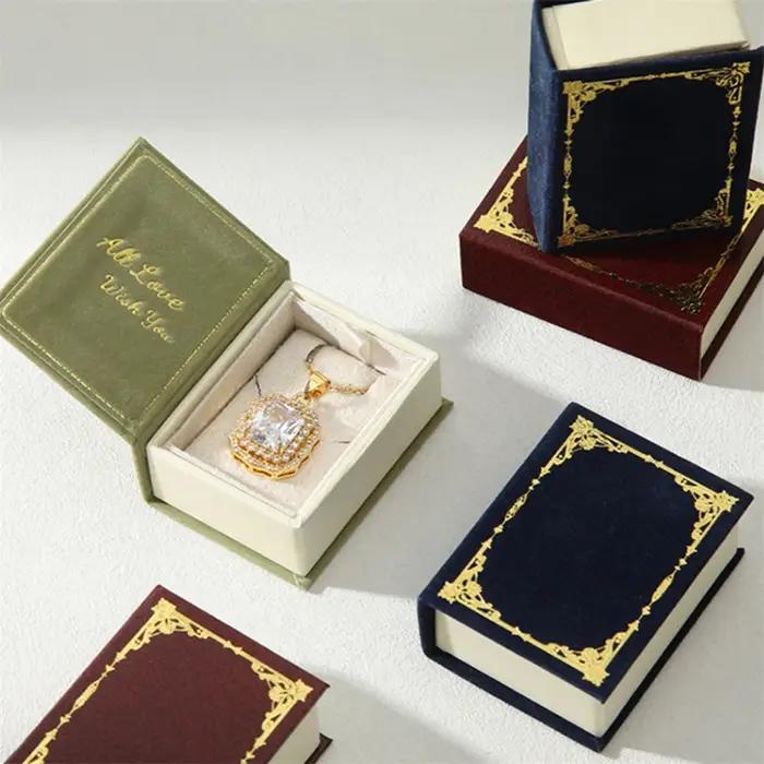 Boîte de rangement et d'affichage de bijoux en forme de livre avec couvercle rabattable pour rangement et affichage de bague, boucles d'oreilles, collier et pendentif occasions spéciales voyage élégant