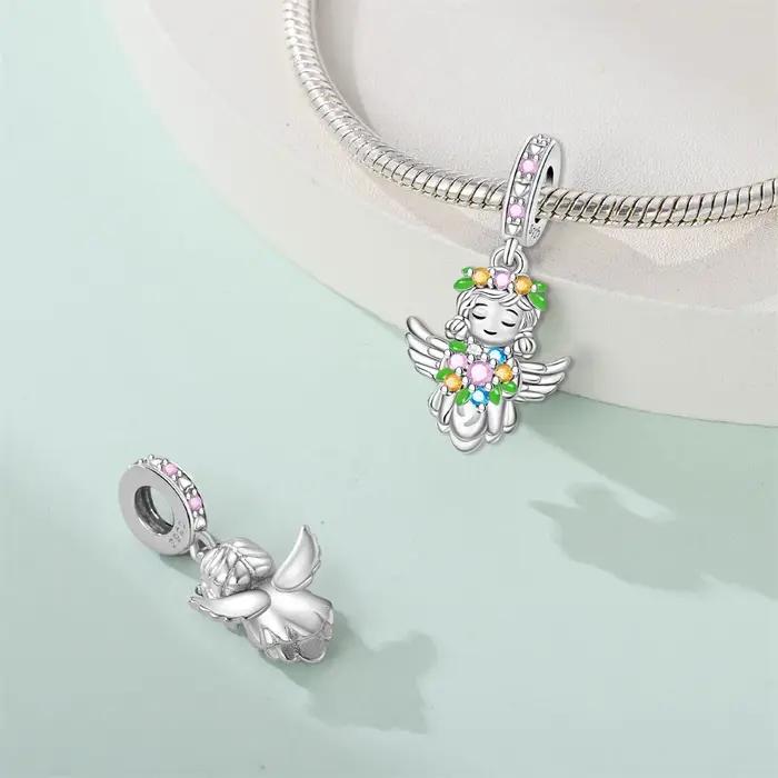 Perles d'aile de pendentif d'ange en argent regardé 925