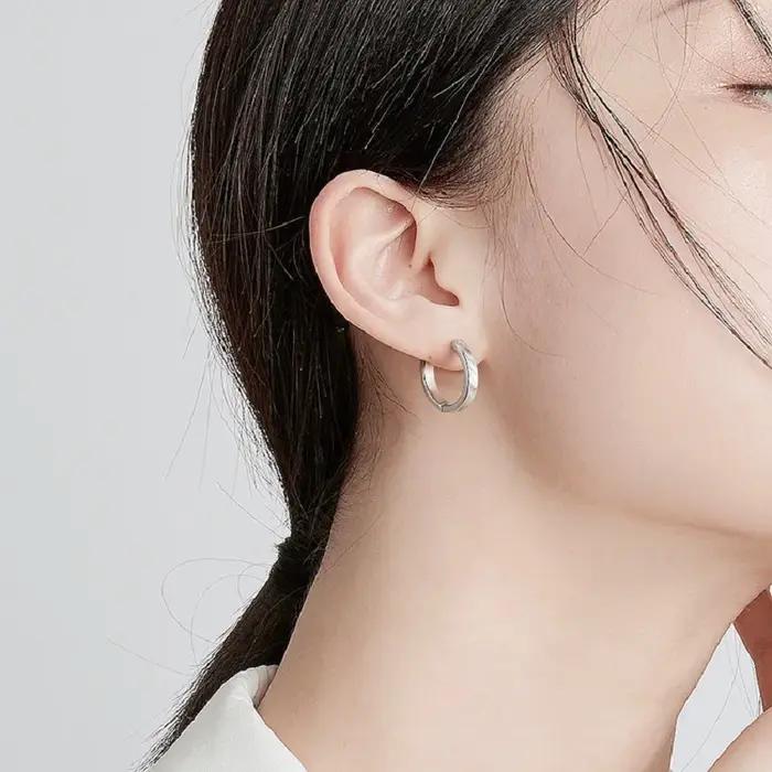 1 paire de boucles d'oreilles en acier inoxydable pour femmes