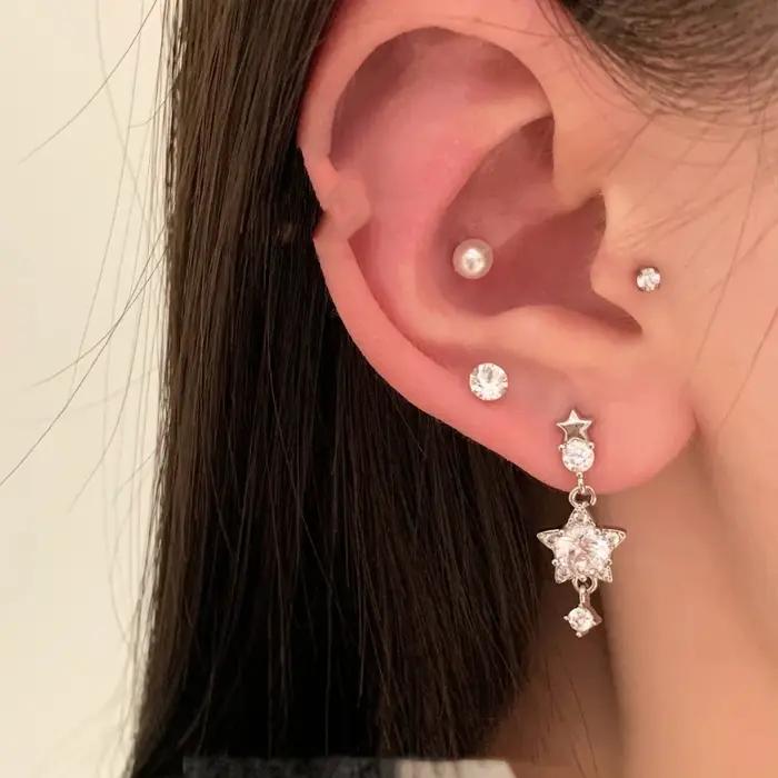 Boucles d'oreilles pendantes en acier chirurgical en forme d'étoile pour femmes