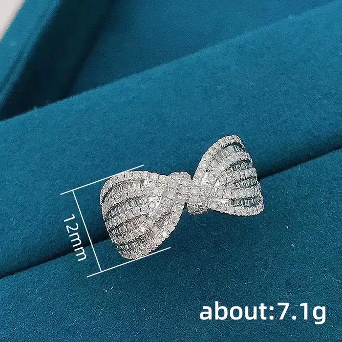 Huitan – bague fantaisie avec nœud éblouissant