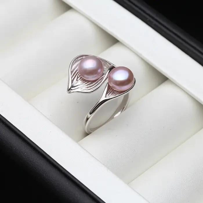 Bague en perles d'eau douce naturelles noires et blanches pour femmes