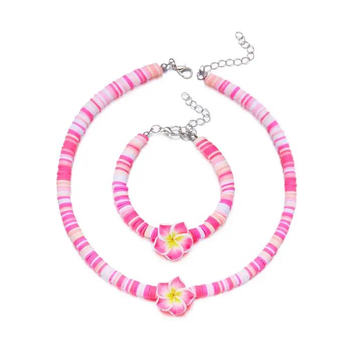 Ensemble collier et bracelet en pâte polymère Frangipani