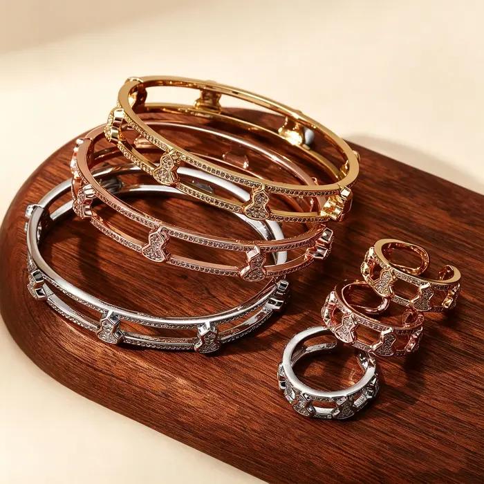 Ensemble bague et bracelet plaqué or avec nœud et zircons