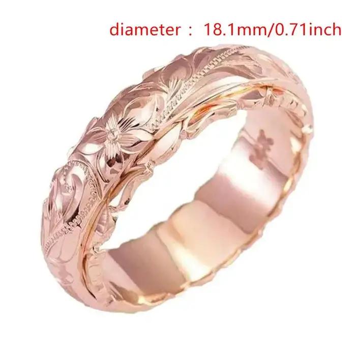 Bague en forme de rose sculptée suspendue de couleur or