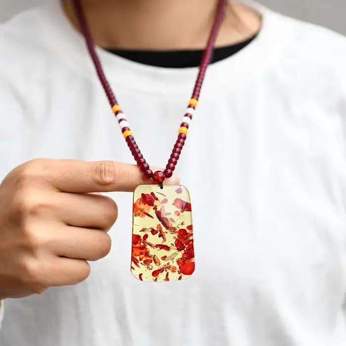 Collier avec pendentif en ambre à fleurs fines pour homme et femme