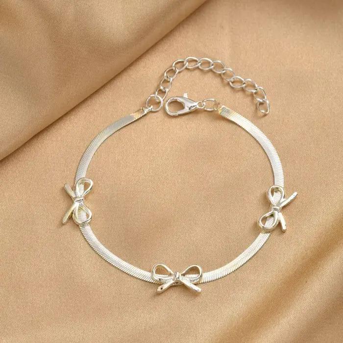 Bracelet Nœud Papillon Argenté avec Chaîne Serpent et Ruban