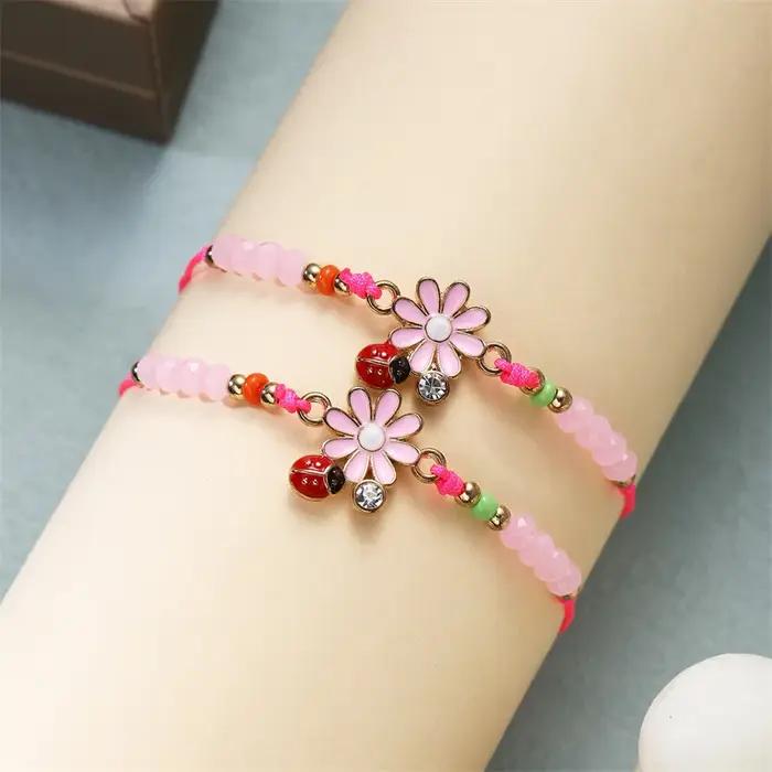 Bracelet tendance et mignon en forme de coccinelle et de marguerite pour femmes