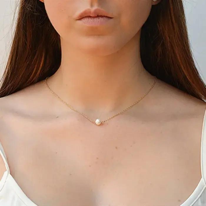 Collier long à pampilles de perles tendance pour femme