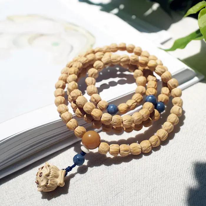 Bracelet multi-tours de 108 perles de graines de Bodhi