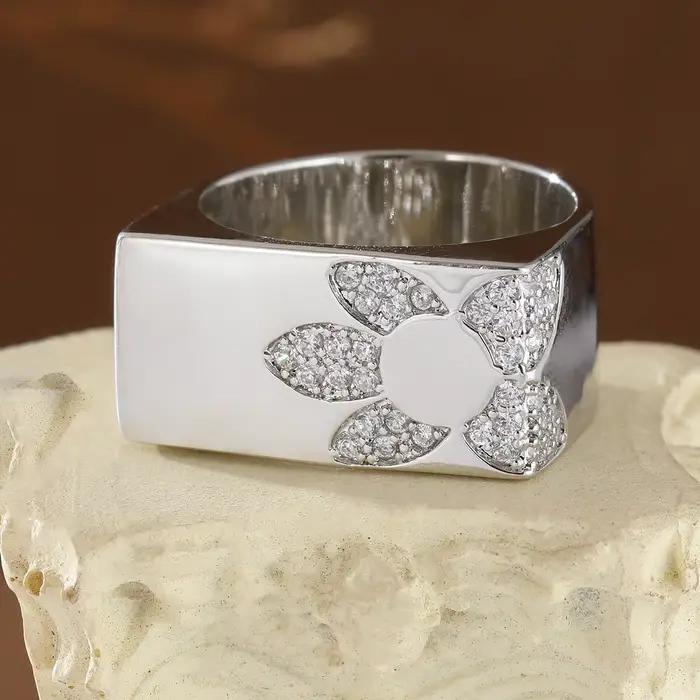 Bague en cuivre de style géométrique moderne avec incrustation florale de pierres précieuses artificielles