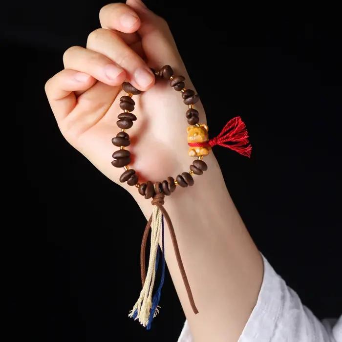 Bracelet mignon de grain de café pour des dames