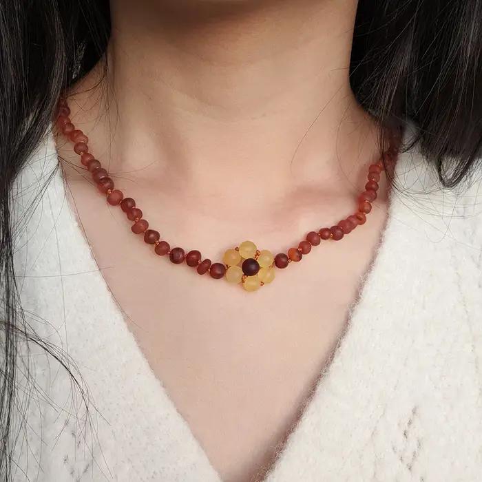 HAOHUPO collier d'ambre pour femmes collier d'ambre or/Cognac avec tournesols fait à la main véritab