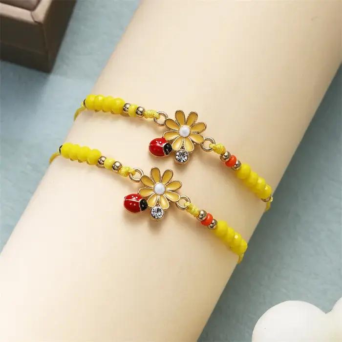 Bracelet tendance et mignon en forme de coccinelle et de marguerite pour femmes