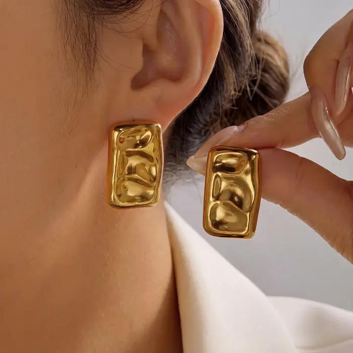 Boucles d'oreilles vintage années 80 dorées pour femme