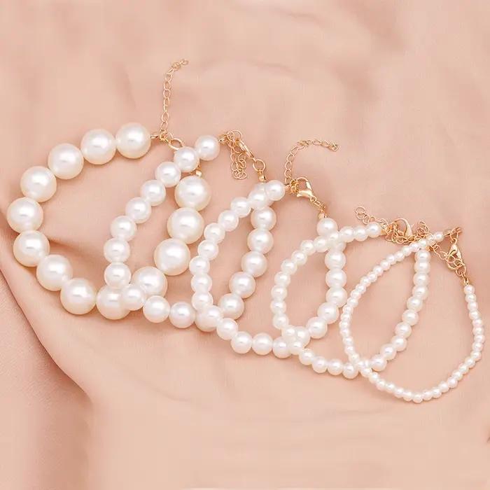 Bracelet élégant en perles d'imitation faites à la main pour femmes et filles