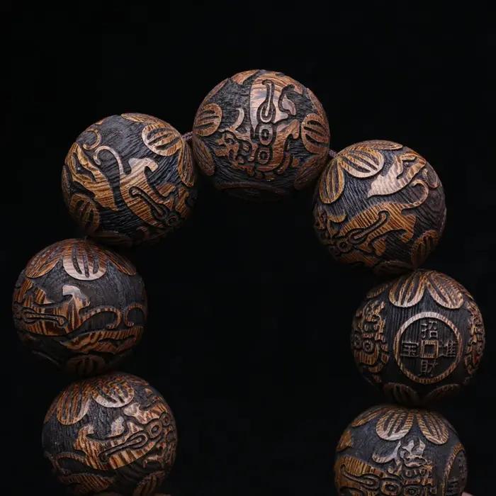 Bracelet en bois naturel sculpté dieu bête richesse