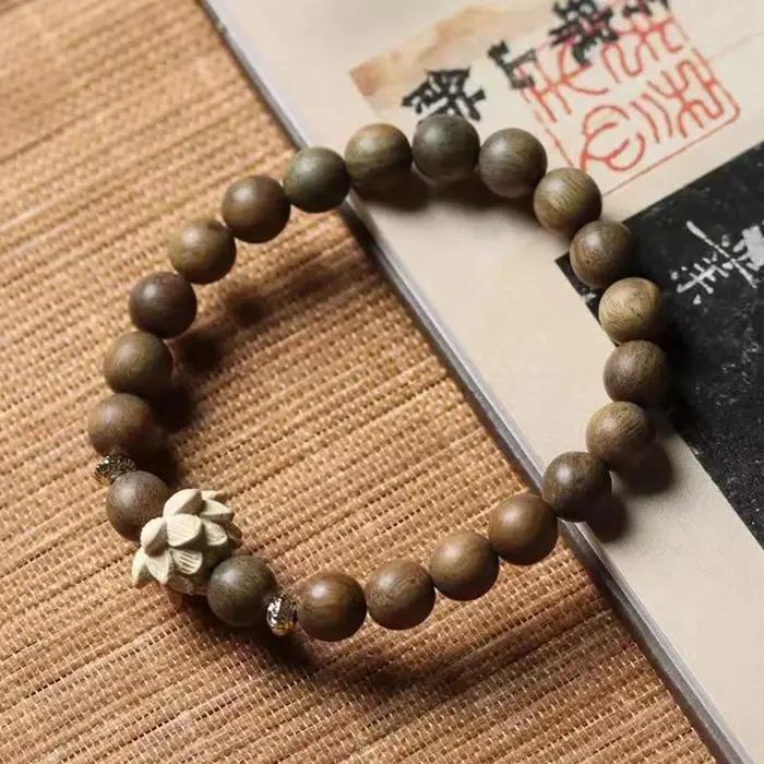 Bracelet Mala de prière en bois de santal avec perles de bois de pêche et de lotus pour homme et femme occasions spirituelles et quotidiennes