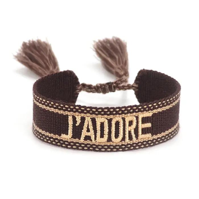Bracelet personnalisable en tissu brodé avec pompon réglable pour l'amitié et les fêtes
