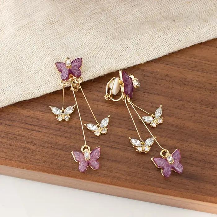 Boucles d'oreilles à clip papillon violet
