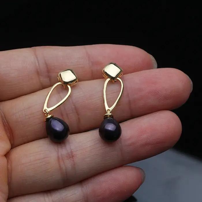 Boucles d'oreilles en perles noires véritable pour femme