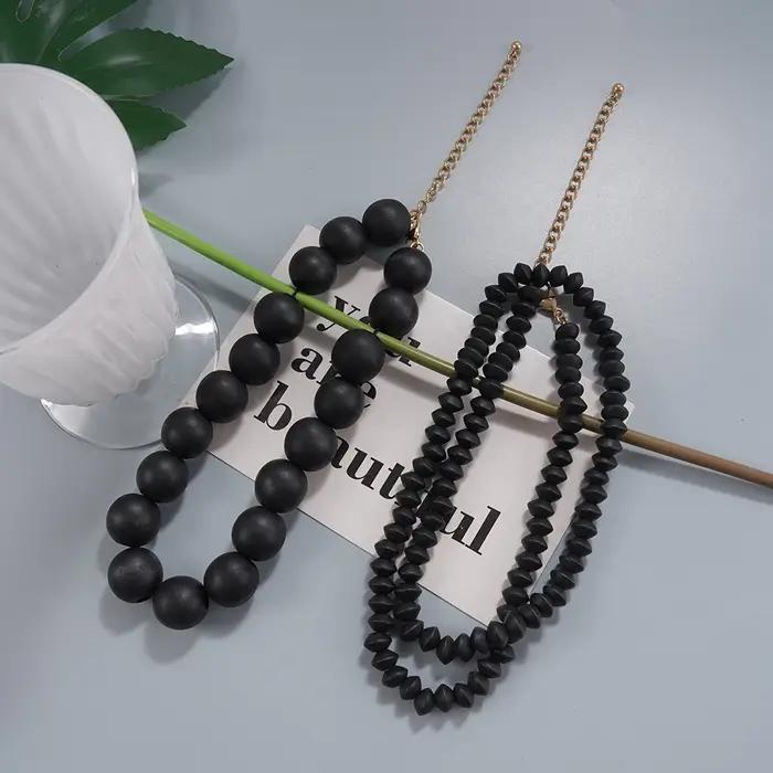 Collier superposé noir minimaliste moderne avec perles – Accessoire tendance pour les brunches et les tenues élégantes