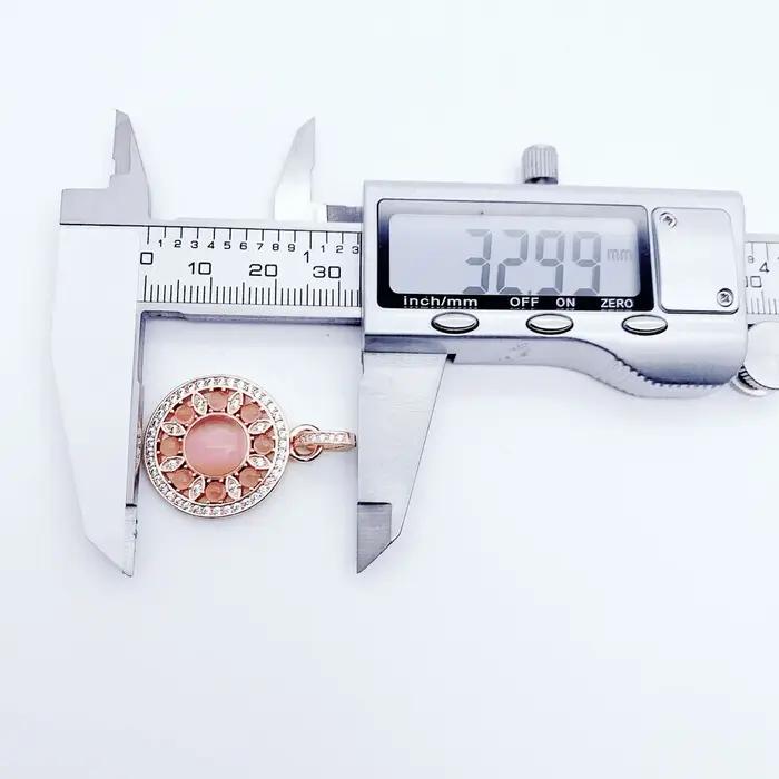 Pendentif ornement en or Rose