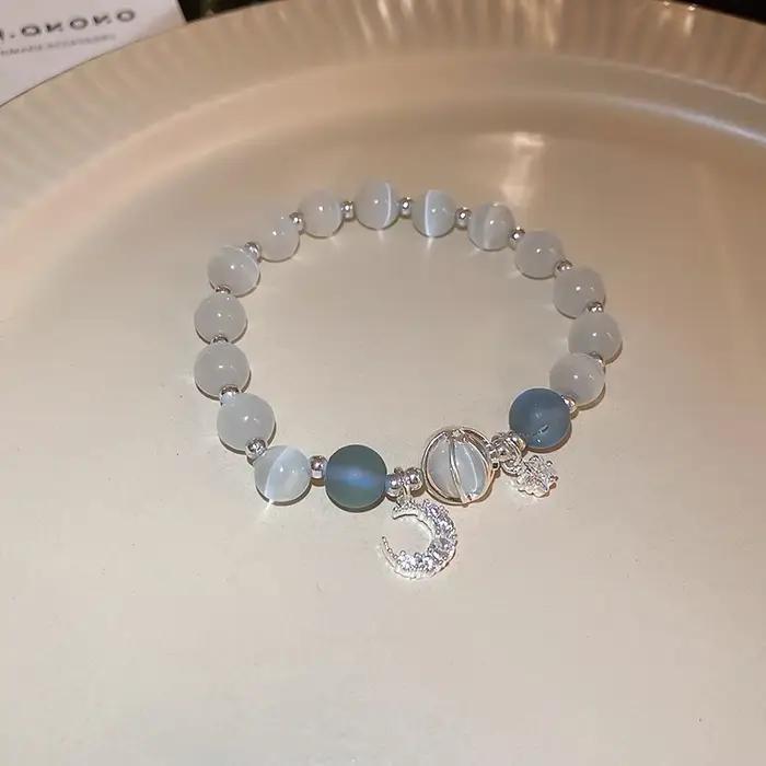 Bracelet en pierre opale bleu-violet avec étoile de la lune pour femmes romantique et élégant à offrir pour les occasions spéciales