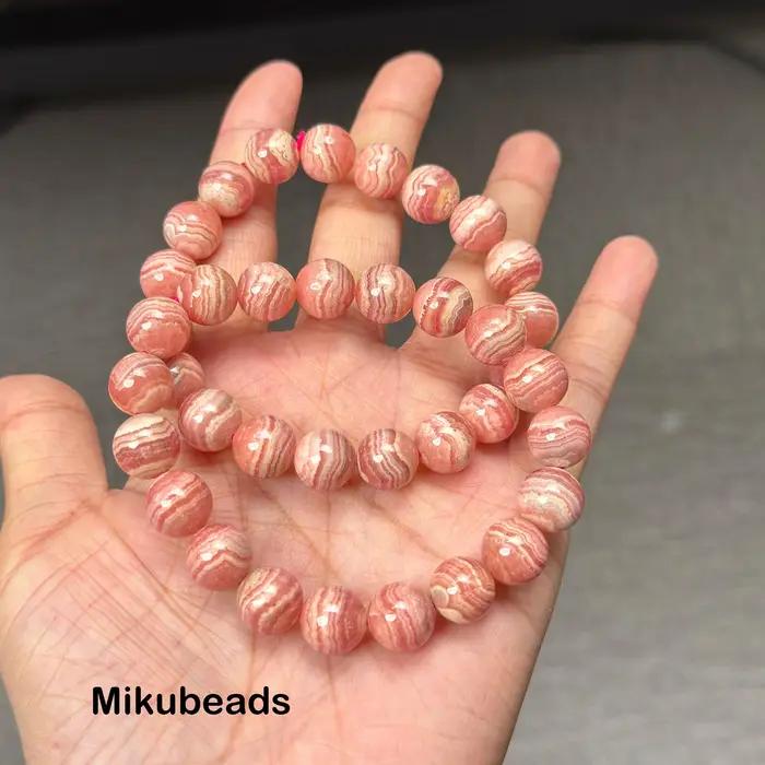 Perles rondes lisses en rhodochrosite naturelle 8-11.5mm 3A