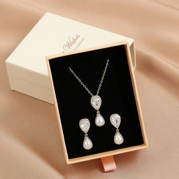 Ensemble de bijoux ZAKOL imitation perle zircone avec boucles d'oreilles et collier pour femmes occasions spéciales mariage et fête