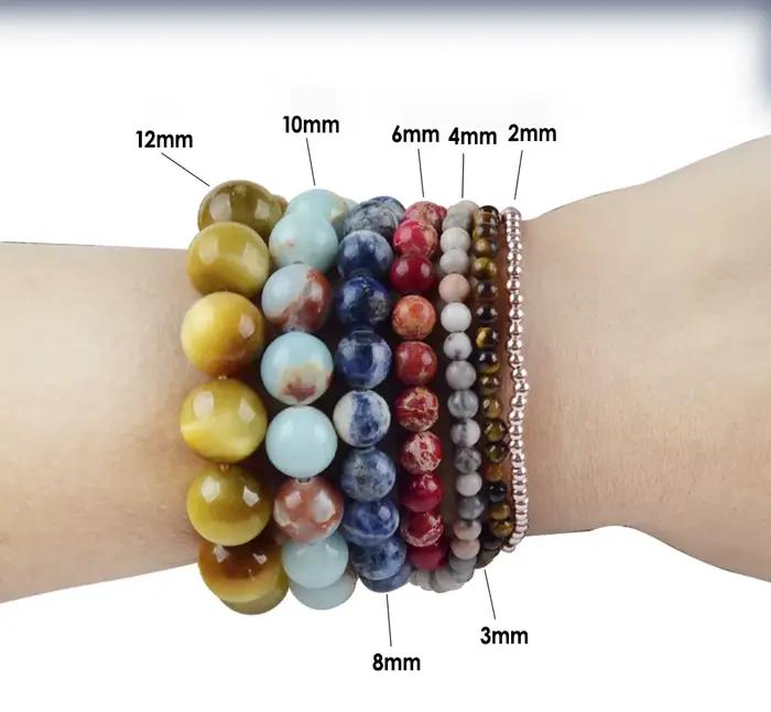 Perles rondes en Rhodonite de toile rouge naturelle