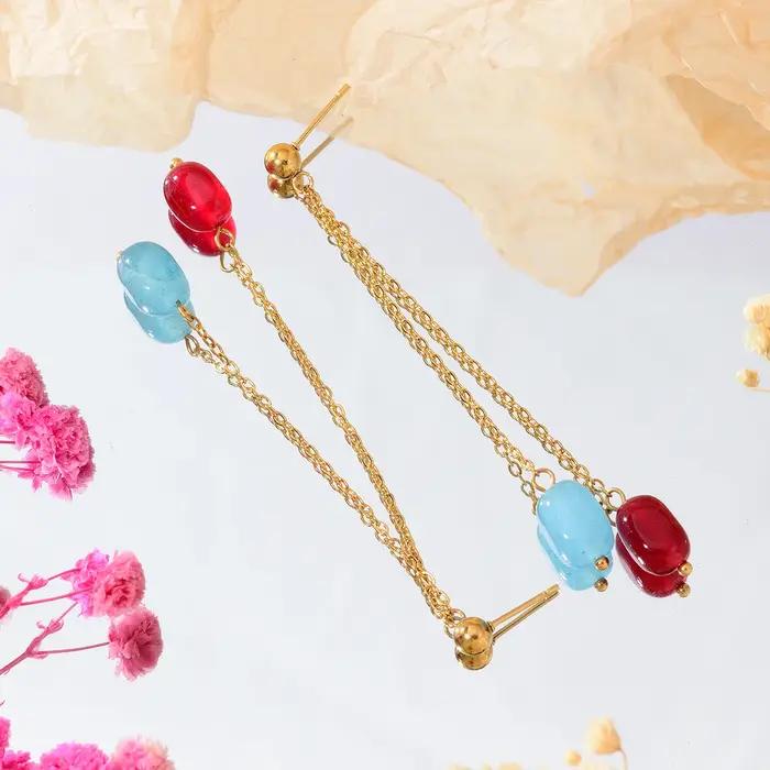 Boucles d'oreilles longues élégantes avec pendentif en pierre colorée