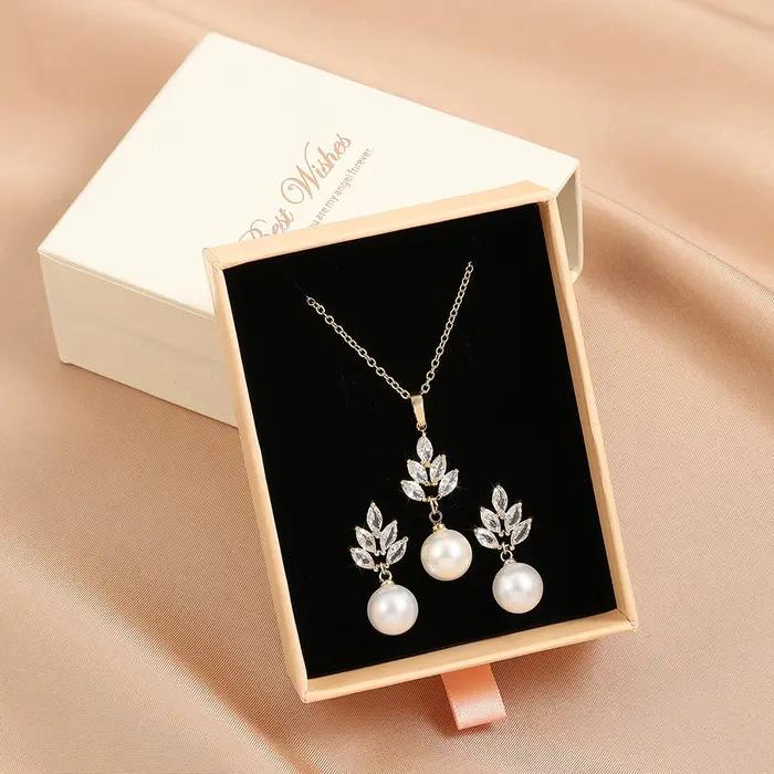 Ensemble de bijoux ZAKOL imitation perle zircone avec boucles d'oreilles et collier pour femmes occasions spéciales mariage et fête